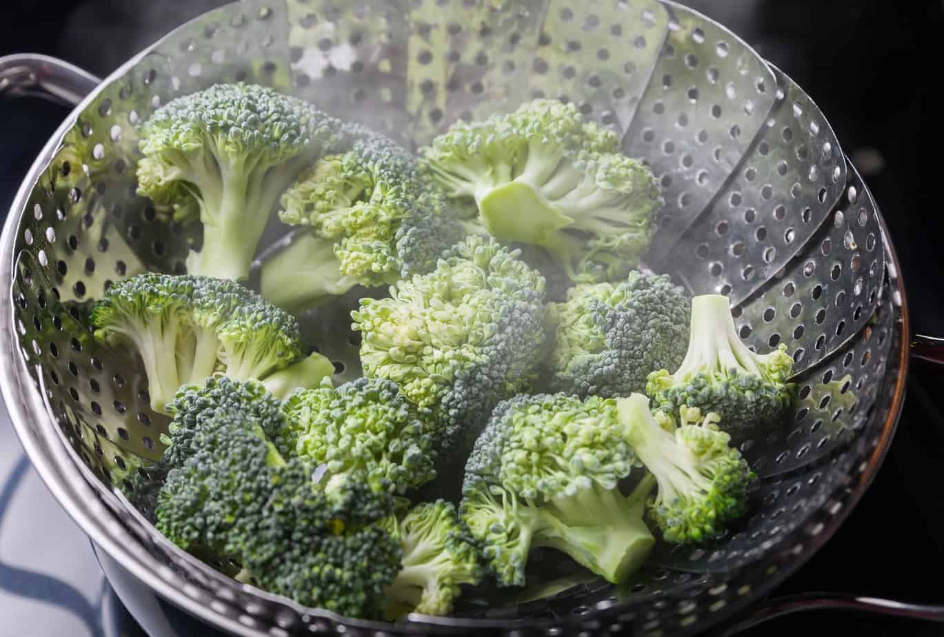 Steamed Green Broccoli In Skimmer Pot