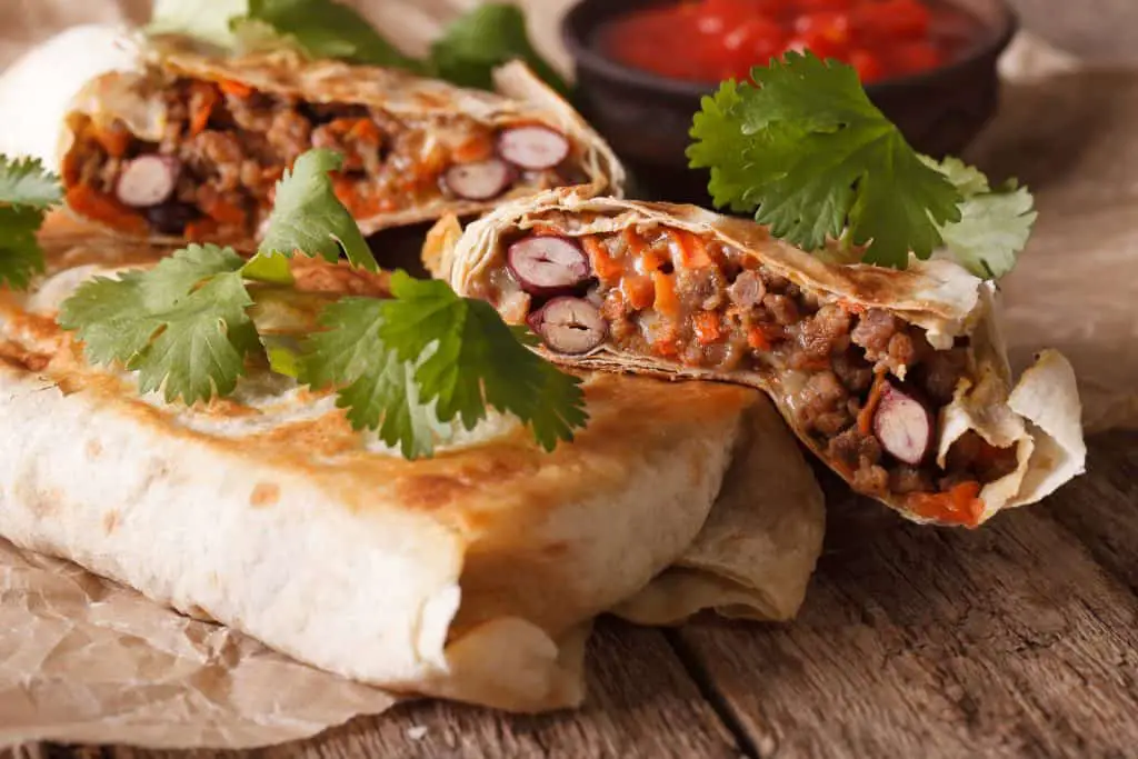 Chimichanga With Ground Meat, Beans And Cheese Macro. Horizontal