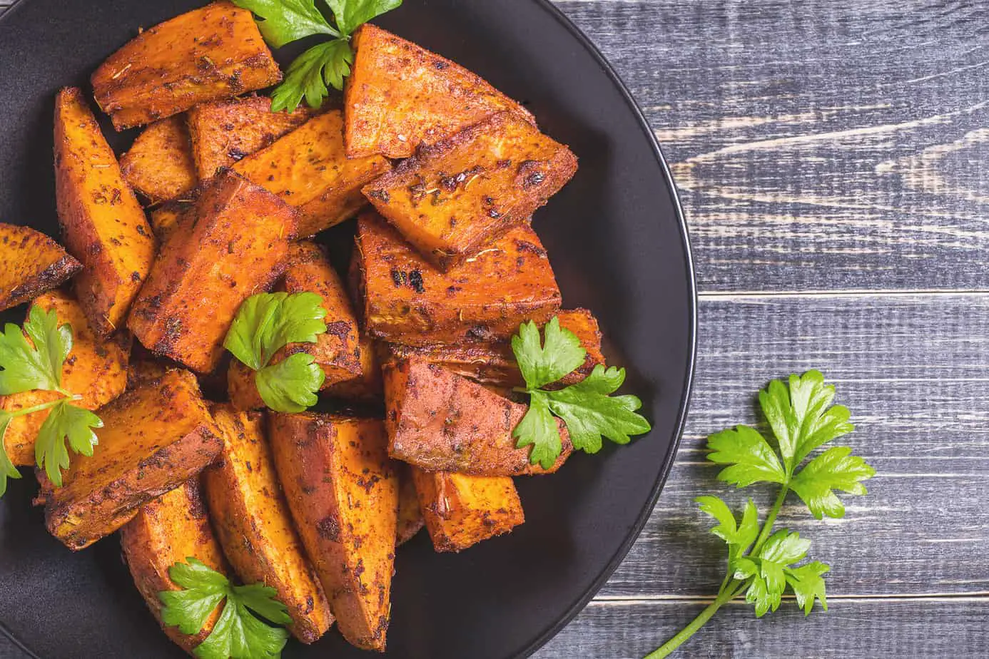 Homemade Cooked Sweet Potato With Spices And Herbs.