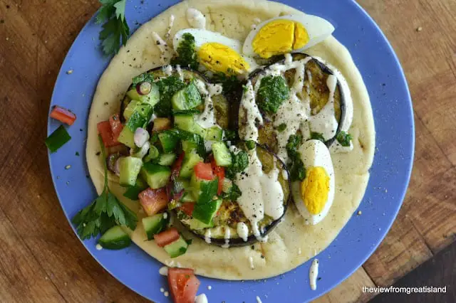 Sabih with Zhoug, Tahini Sauce, and Mediterranean Chopped Salad