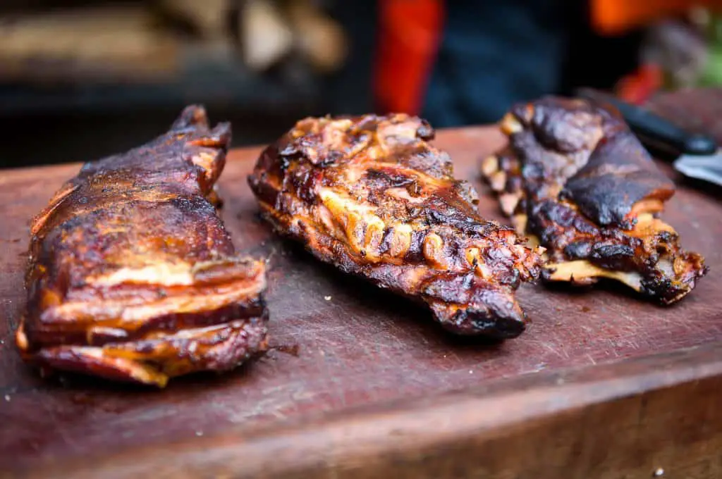 Grilled Spare Beef Or Pork Back Ribs Prepared In Smoker.
