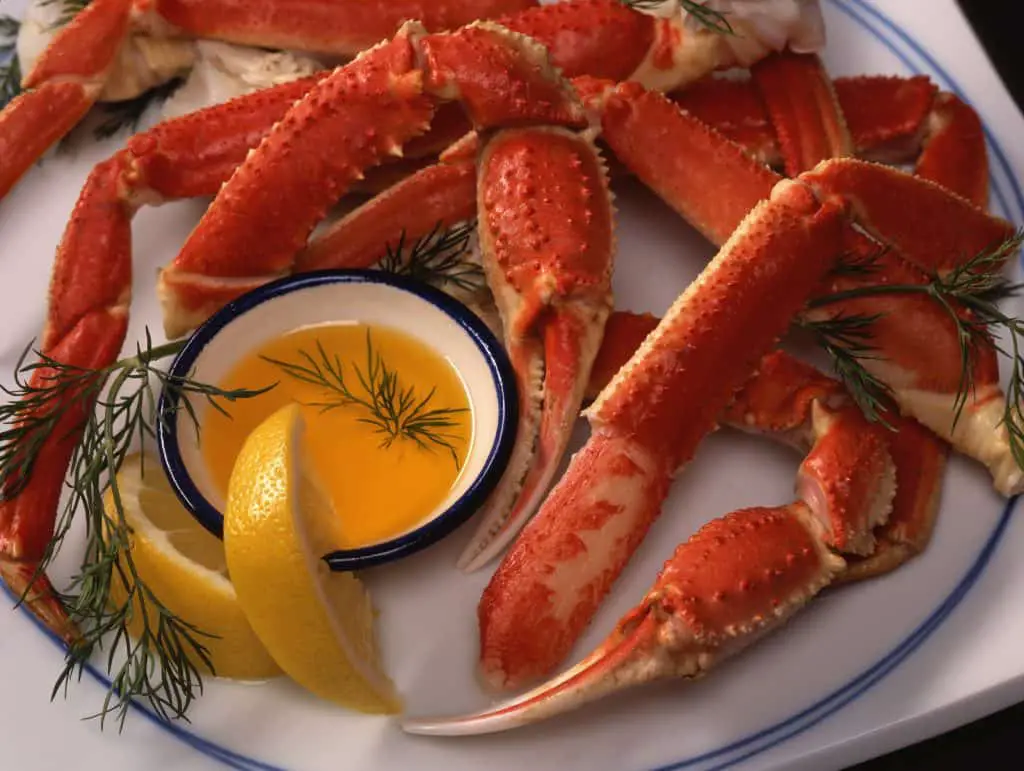 Platter Of King Crab Legs With Butter And Lemon