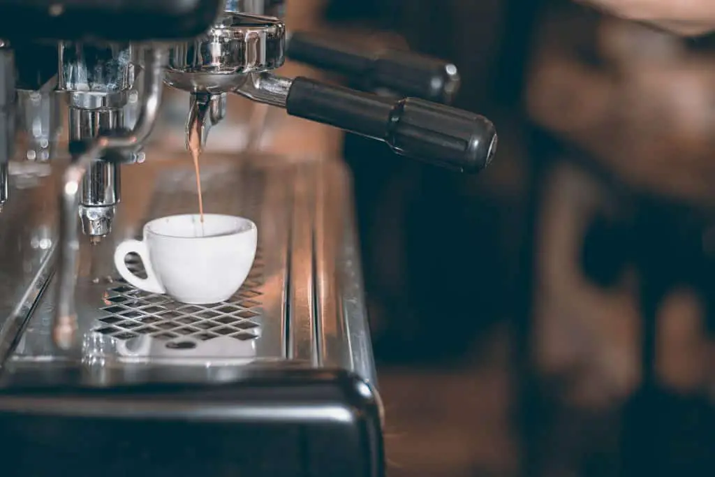 Espresso Machine Making Coffee, Golden Espresso Flowing. Coffee